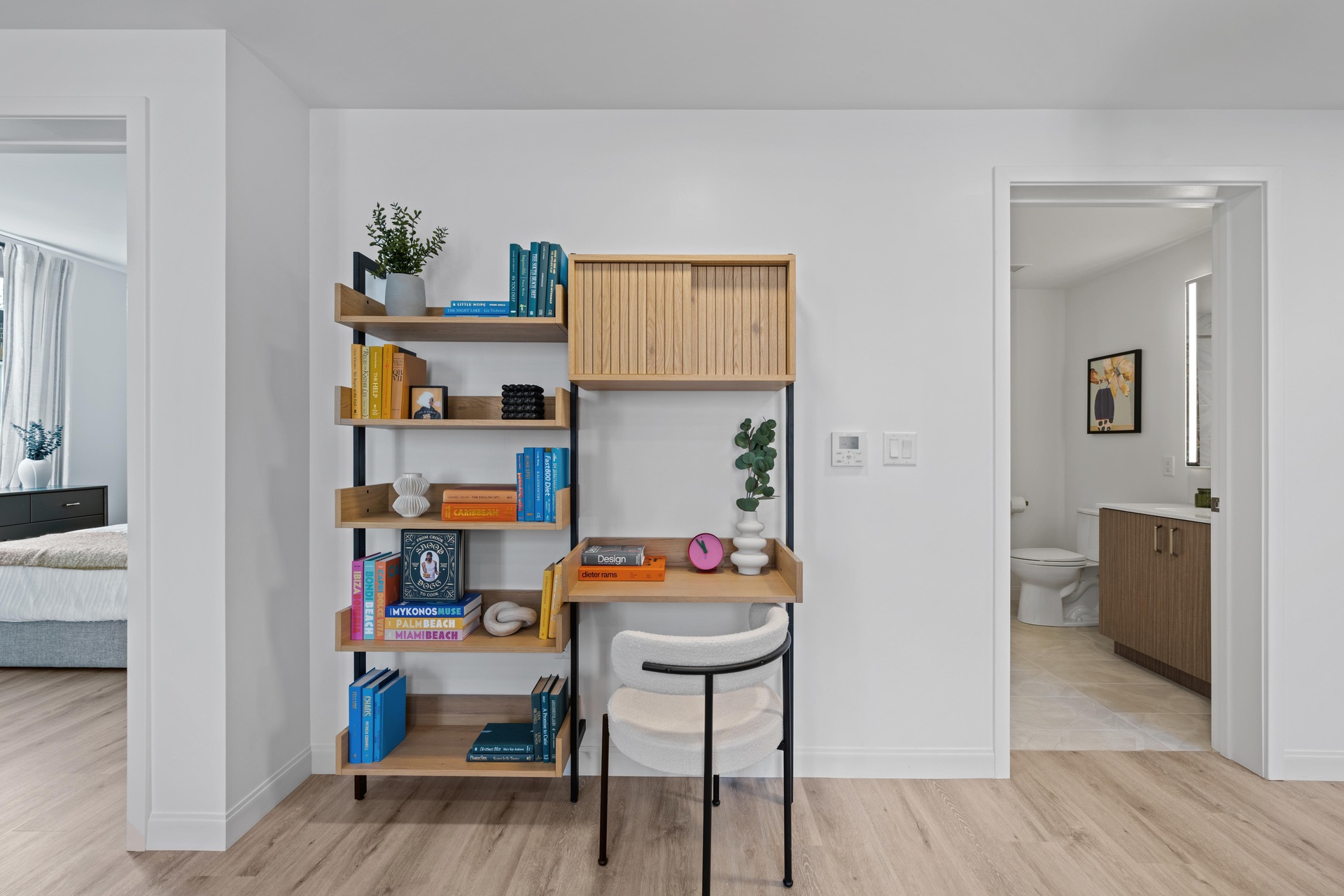 Living area with a designated workspace.