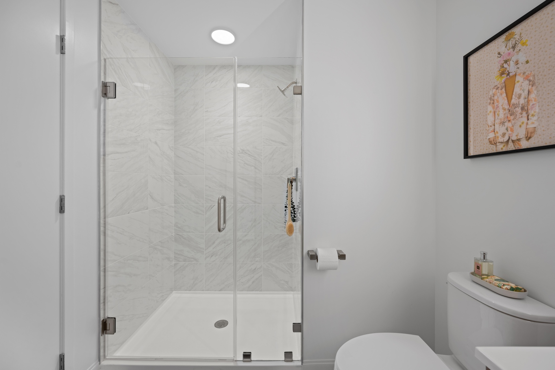 Contemporary shower with elegant fixtures.