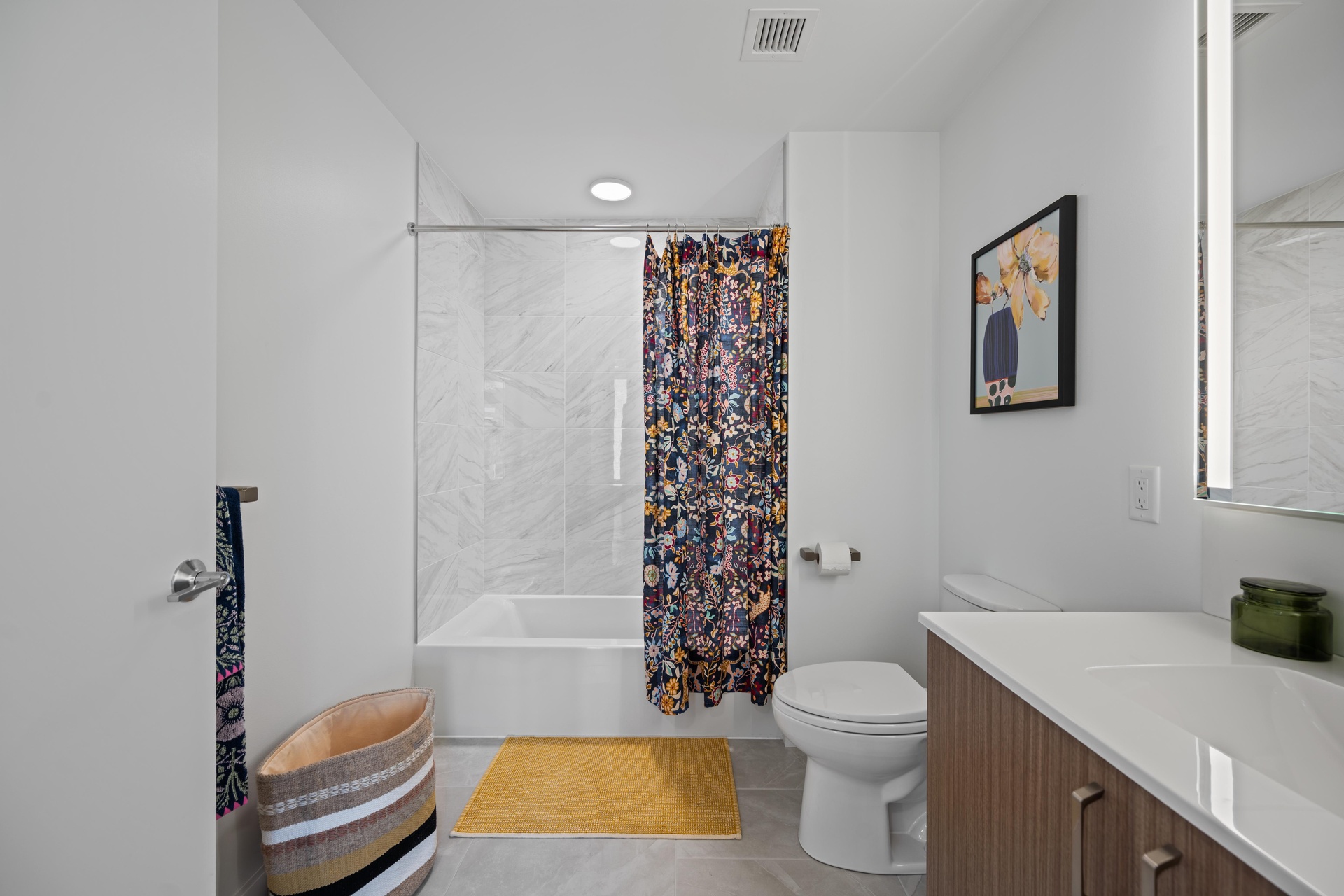 Ensuite bathroom with a luxurious tub.