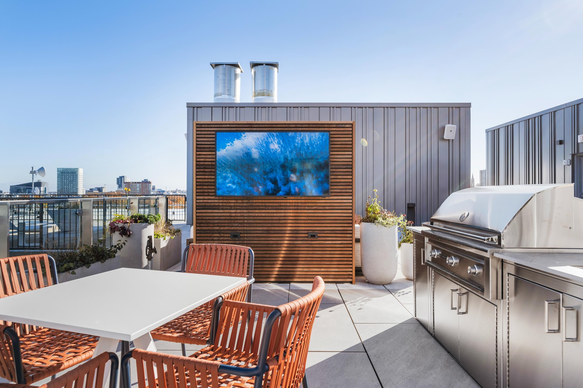 Grill and gather in inviting rooftop dining spaces.